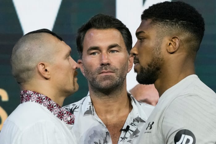 Heavyweight boxers Britain’s Anthony Joshua (right) and Ukraine’s Oleksandr Usyk face off during a weigh-in at King Abdullah Sports City.